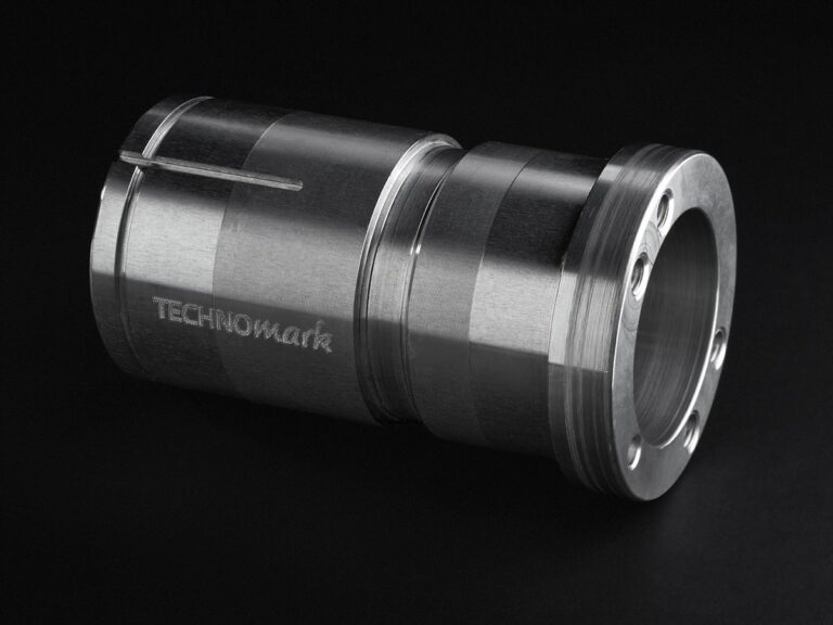 Dot peen logo on cylindrical part