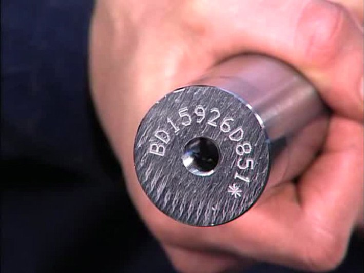 Dot peen serial number on shaft end